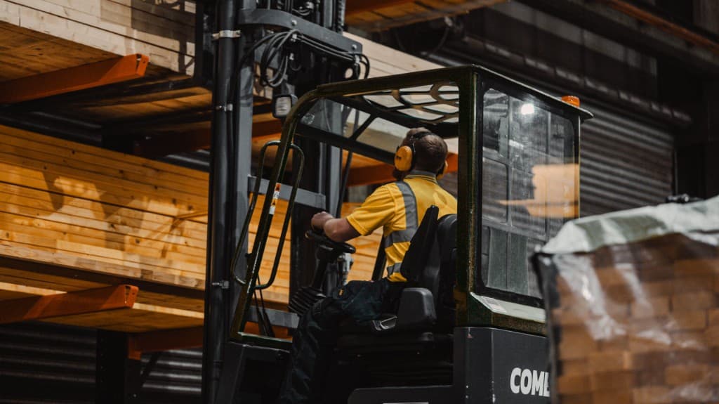 Overhead view of timber frame manufacturing floor